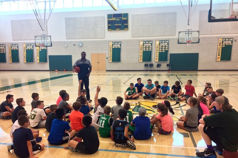 Allen Williamson, 2013 D3 Final Four MVP and Assistant Coach at the Pingree School, gives a talk to the campers.